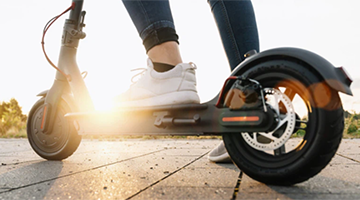 Feet on e-Scooter