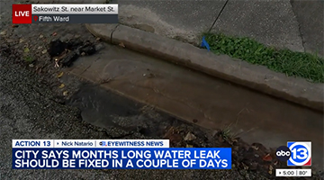 Water Leak by a Sidewalk