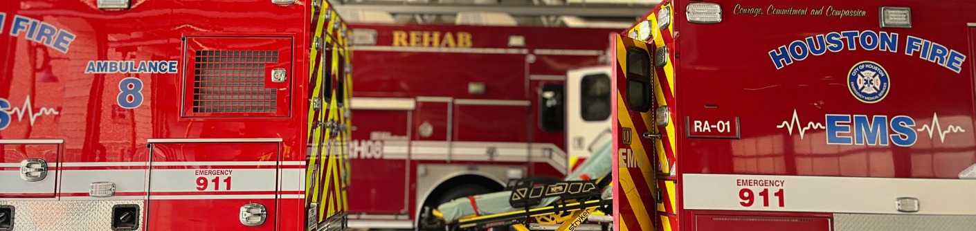 photo of HFD crew in front of their fire station during snow