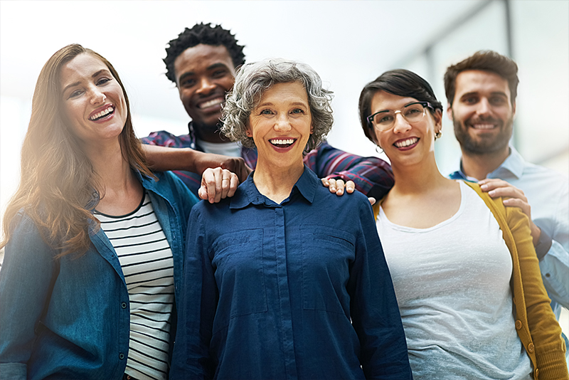 Five Smiling Employees