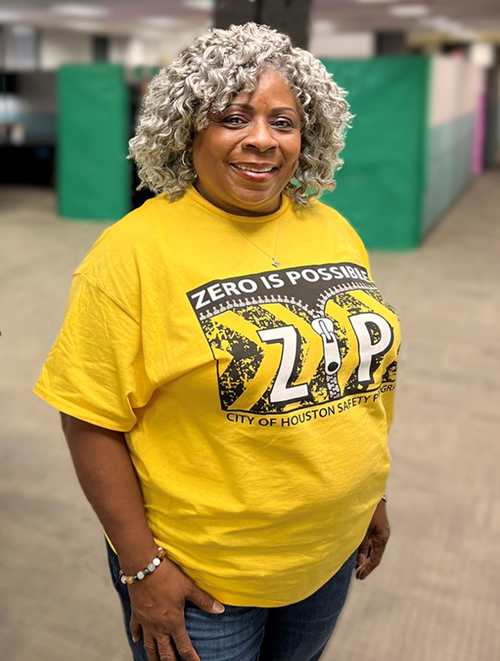 coh employee in zip shirt