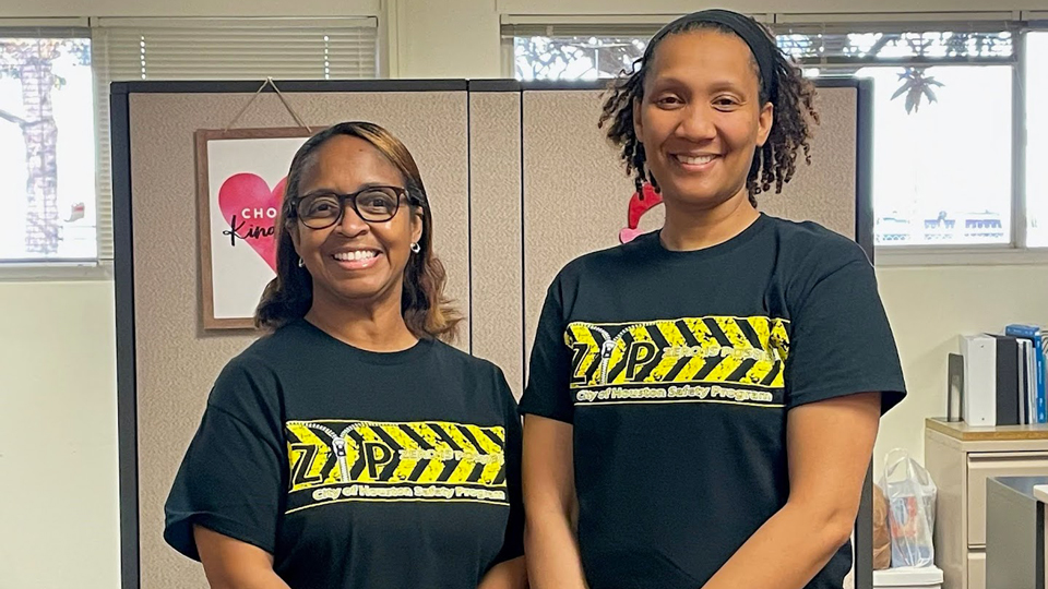 COH employees in Zip tshirts