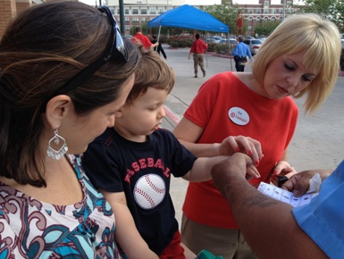 Houston police officers and members of the Greater Houston Loss Prevention Alliance (GHLPA) took time out of their schedules today (May 3) to fingerprint children and offer safety tips to shopping parents at Target on 2580 Shearn.