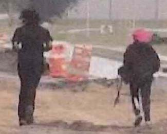 Surveillance photo of the suspects fleeing the scene